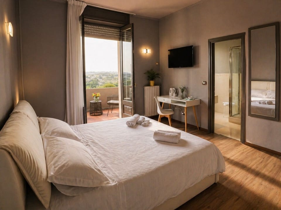 Comfort Triple Room, Valley View | Minibar, in-room safe, desk, blackout drapes