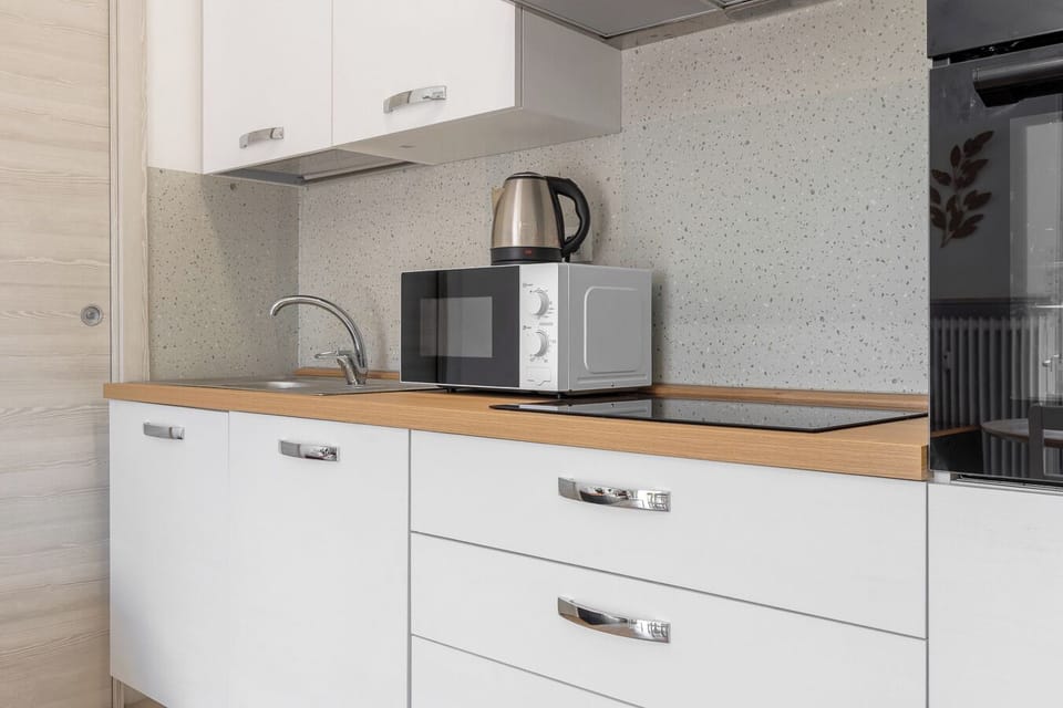 Apartment, 2 Bedrooms, Balcony | Private kitchen | Espresso maker, coffee/tea maker, electric kettle