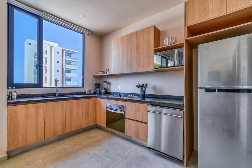 Comfort Condo, 1 King Bed with Sofa bed, Balcony, Beach View | Private kitchen