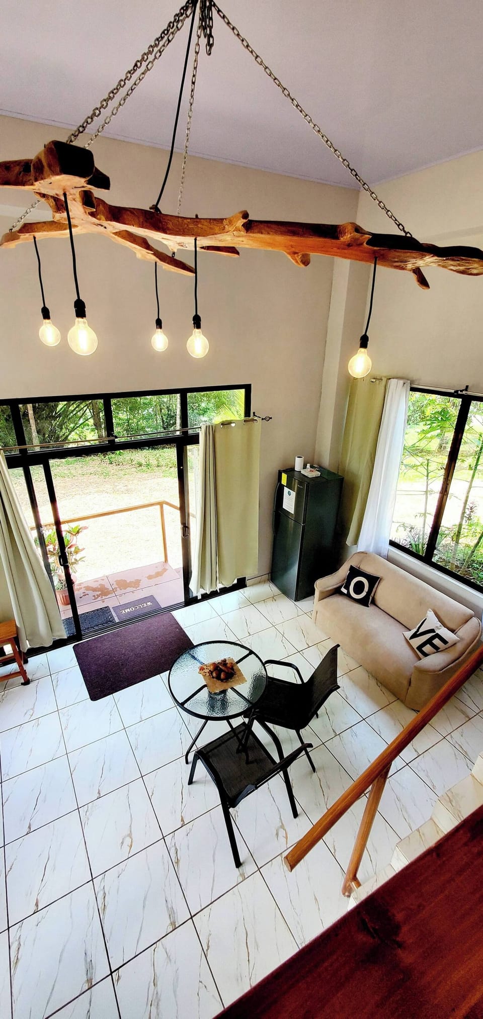 Apartment, 1 Bedroom, Patio | Living room | Books