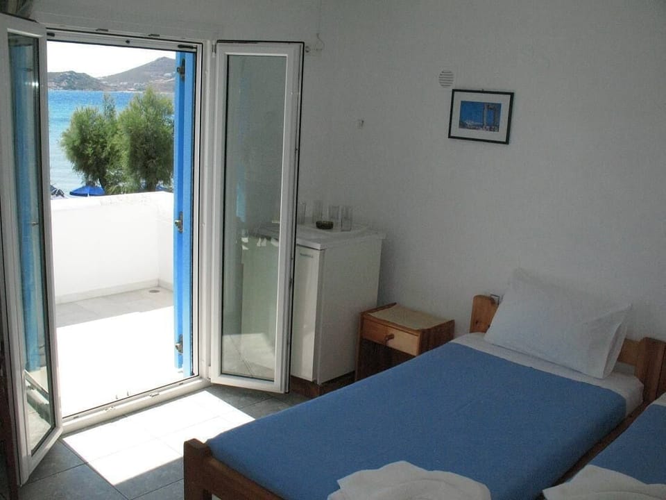 Standard Double Room, Balcony, Beach View | In-room safe, free WiFi