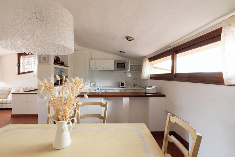 Duplex, Sea View | Private kitchen | Espresso maker, coffee/tea maker, electric kettle, highchair