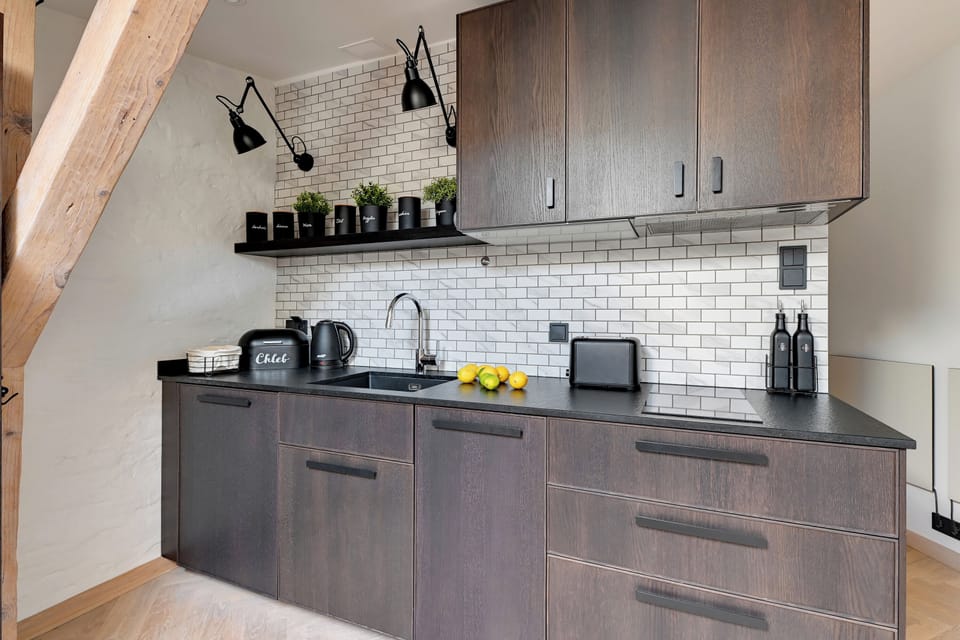 Economy Studio Suite, City View | Private kitchen | Electric kettle, highchair