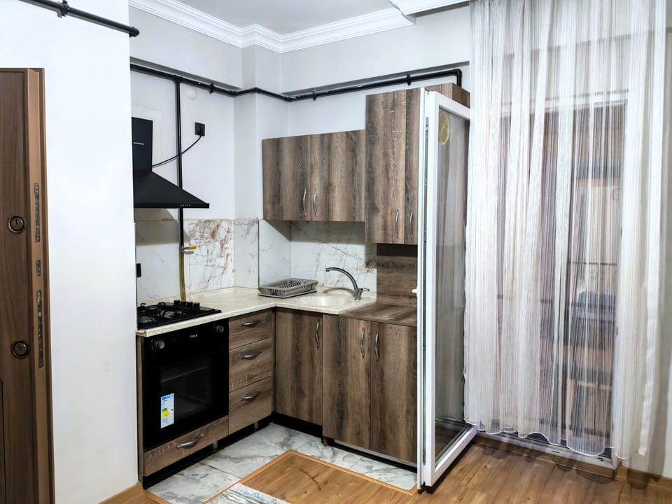Apartment, Multiple Beds, Kitchen | Private kitchen | Fridge, oven, stovetop