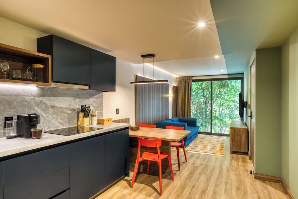 Full-size fridge, microwave, stovetop, blender