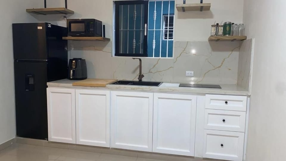 Fridge, microwave, cookware/dishes/utensils