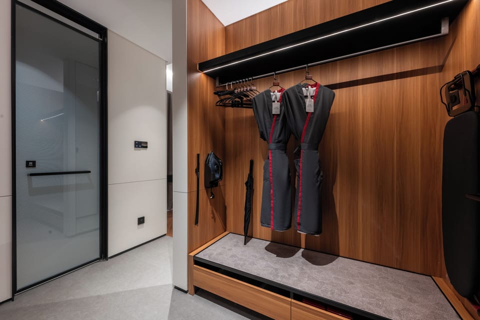 Shower, hair dryer, slippers, towels