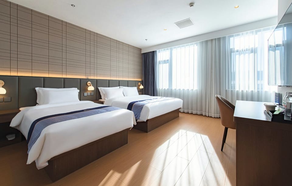 Family Twin Room, City View | View from room