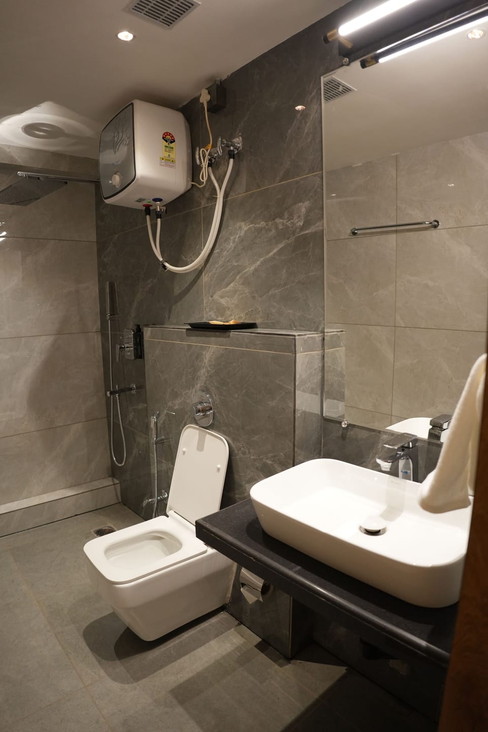 Shower, free toiletries, hair dryer, slippers