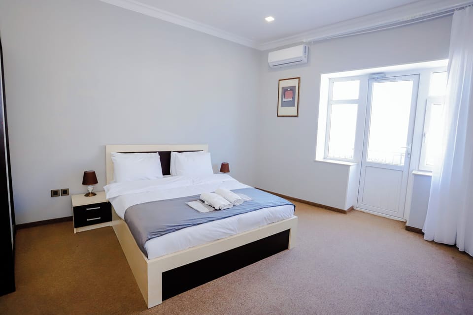 Deluxe Double Room, Balcony | Desk, laptop workspace, iron/ironing board, free WiFi