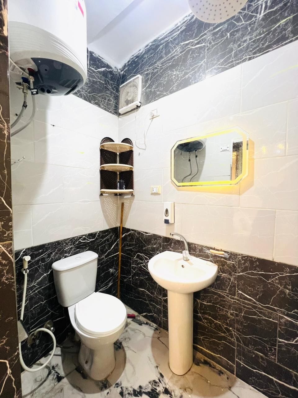 Economy Triple Room | Bathroom | Shower, hair dryer, bathrobes, slippers