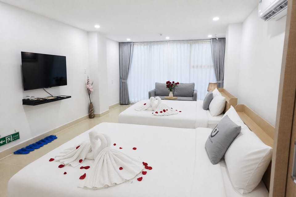 Standard Quadruple Room, City View | Soundproofing, iron/ironing board, WiFi (free)