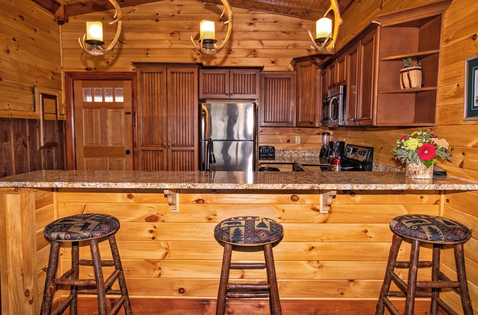 Microwave, coffee/tea maker, cleaning supplies, paper towels