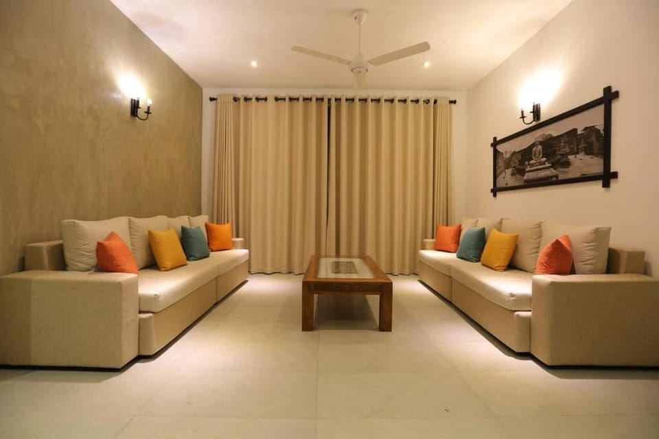 Deluxe Double Room, Balcony, Lake View | Living area | TV