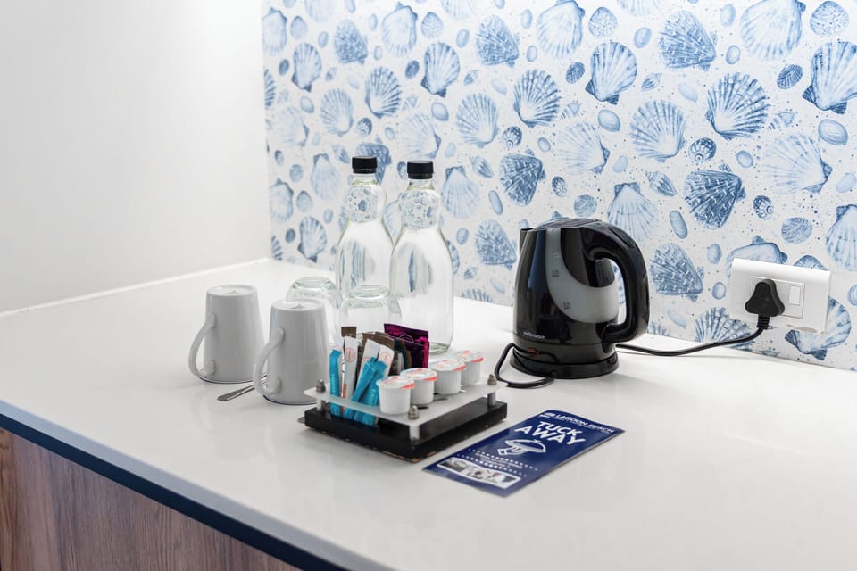 Premium bedding, down comforters, pillowtop beds, in-room safe