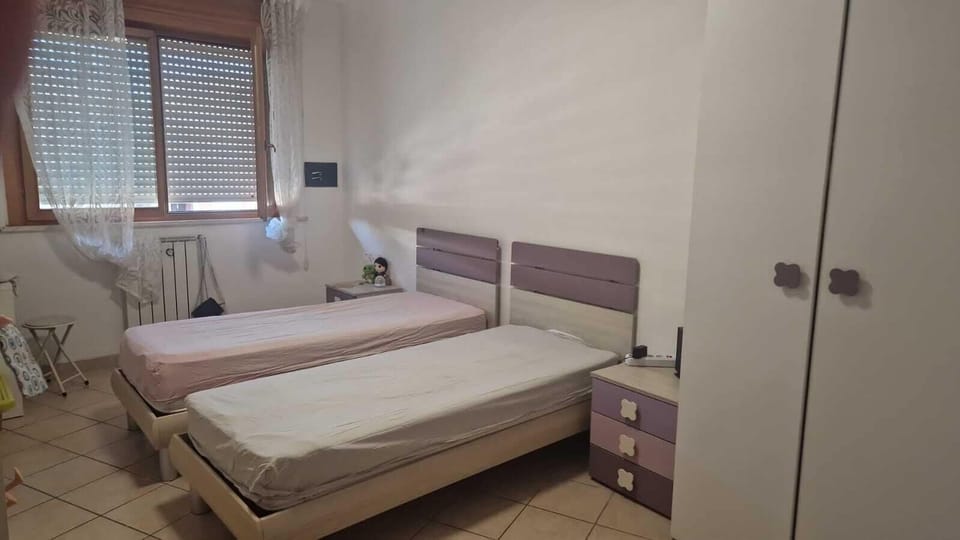 Twin Room | Blackout drapes, iron/ironing board, free WiFi