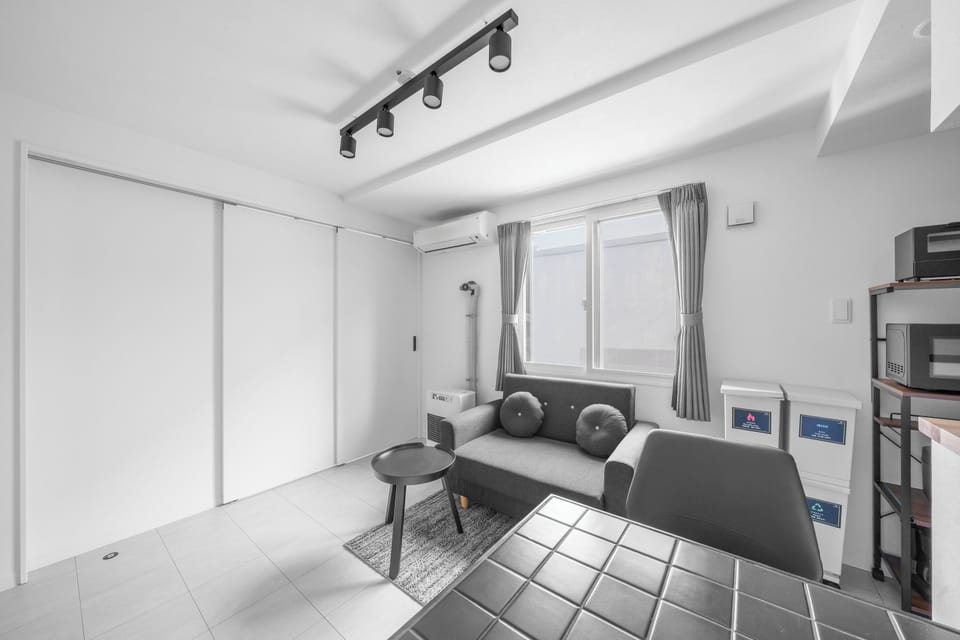 Apartment | Living area | 43-inch flat-screen TV with digital channels