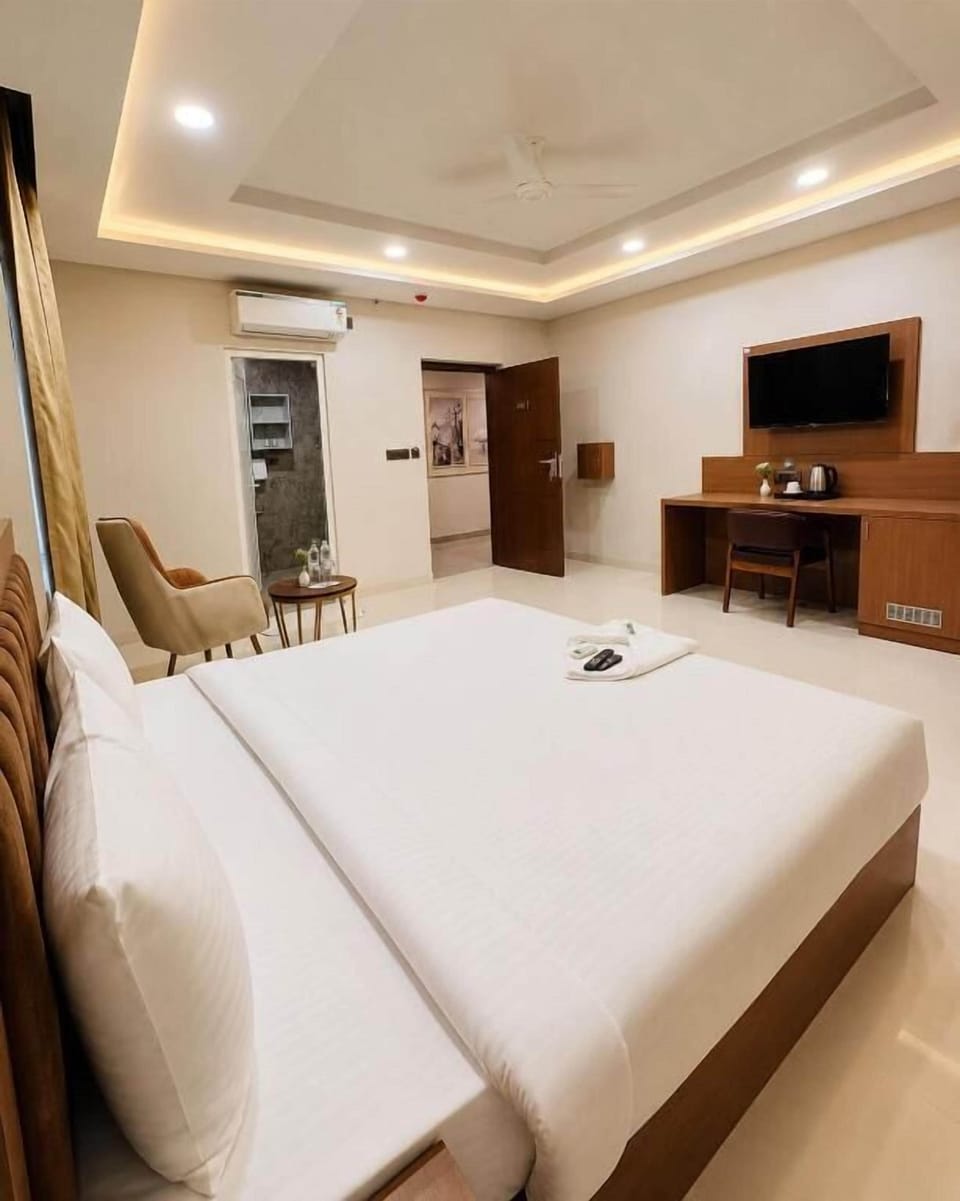 Deluxe Double Room, Hill View | Minibar, in-room safe, desk, laptop workspace
