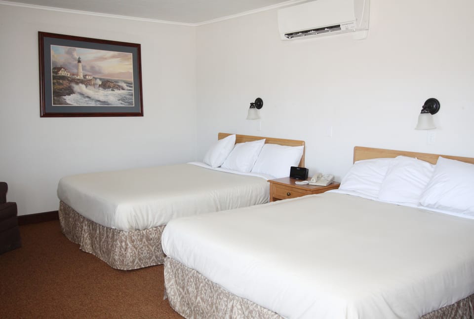 Room, 2 Queen Beds (Not Pet-Friendly) | Desk, laptop workspace, rollaway beds, free WiFi