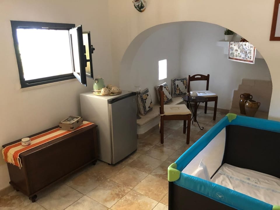 Deluxe Suite, Pool View | Laptop workspace, WiFi (free), individually decorated