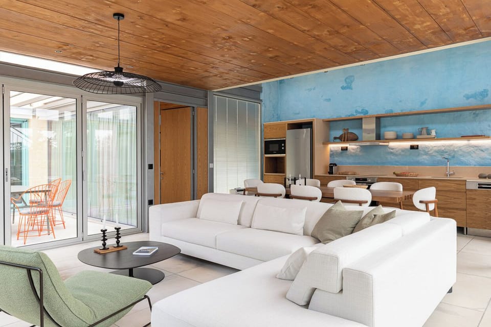 Family House, 4 Bedrooms | Living area | 50-inch Smart TV with digital channels, Netflix, streaming services