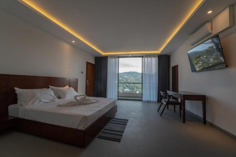 Deluxe Double Room, Balcony, Mountain View | Laptop workspace, free WiFi