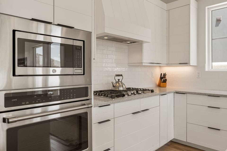 Townhome, Multiple Bedrooms | Private kitchen | Fridge, oven, coffee/tea maker, toaster