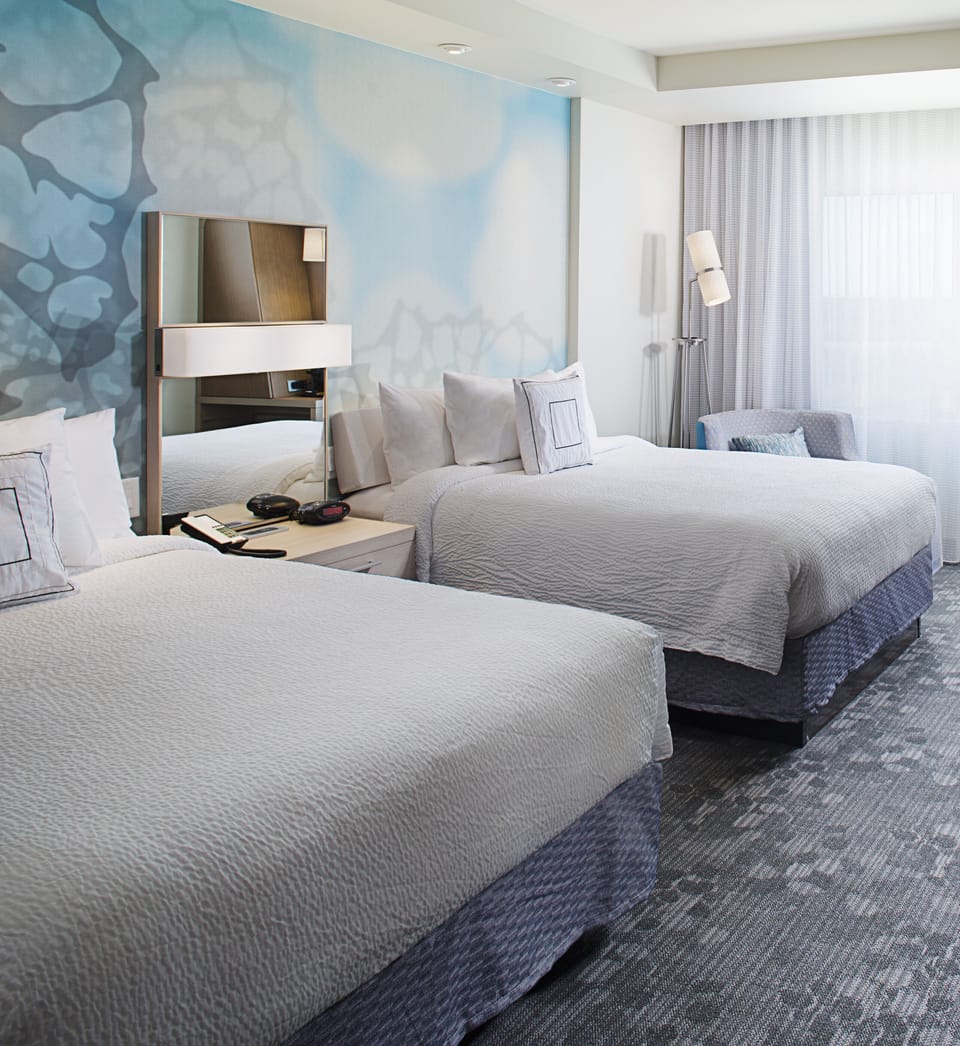 Premium bedding, down comforters, desk, laptop workspace