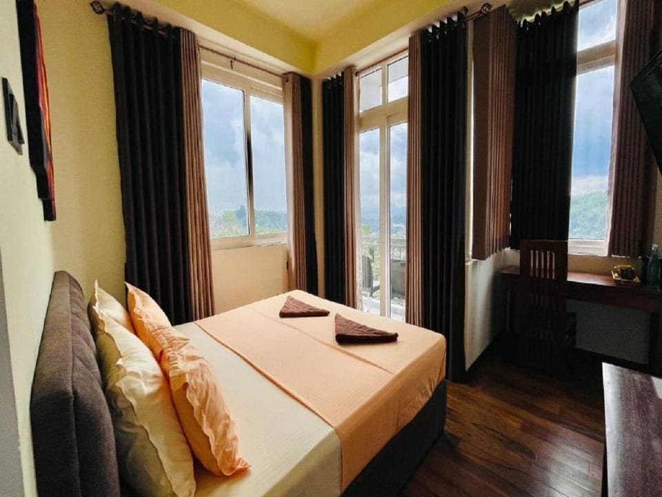 Deluxe Double Room, Balcony, Garden View | Laptop workspace, free WiFi