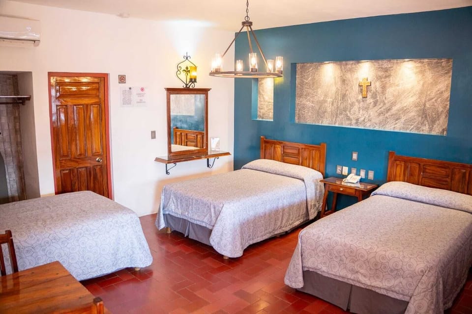 Comfort Triple Room, City View | In-room safe, desk, laptop workspace, blackout drapes