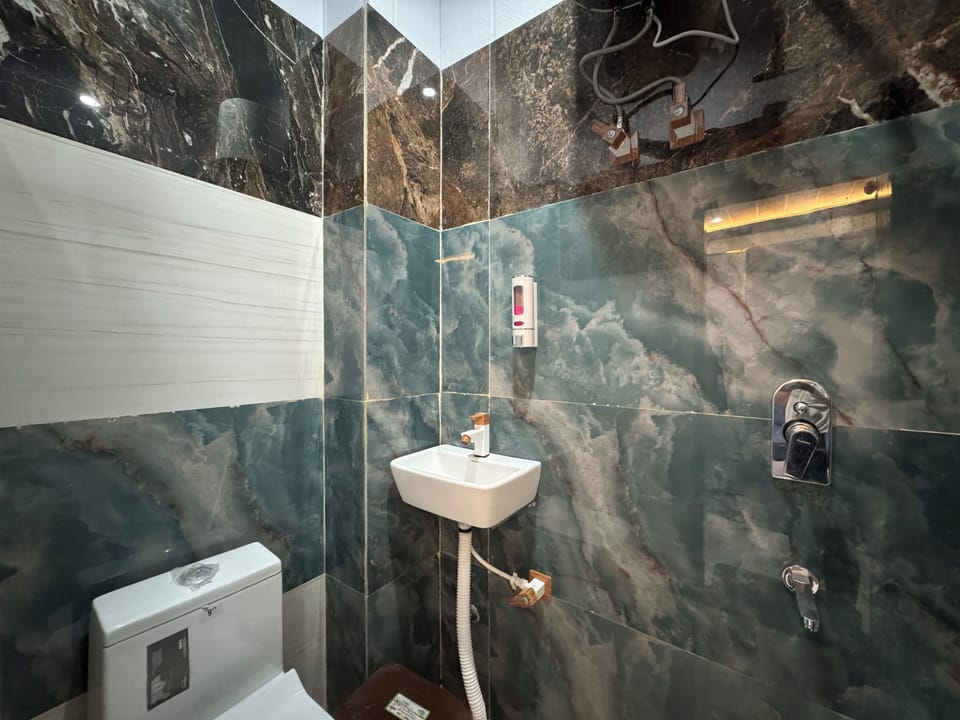 Shower, towels, soap, shampoo