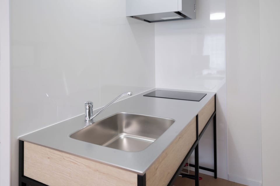 Apartment | Private kitchen | Fridge, microwave, stovetop, cookware/dishes/utensils