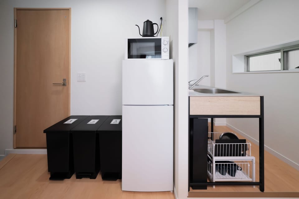 Apartment | Private kitchen | Fridge, microwave, stovetop, cookware/dishes/utensils