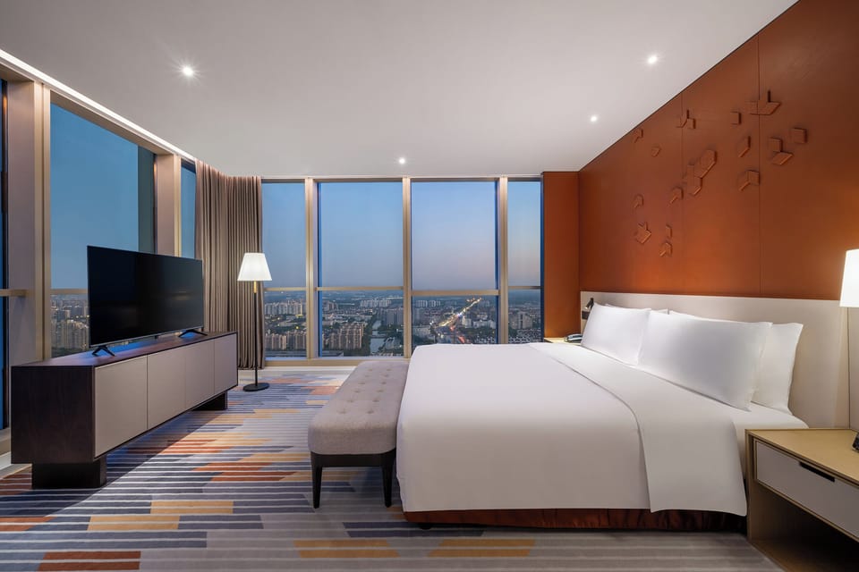Executive Suite, Private Bathroom | Desk, laptop workspace, blackout drapes, iron/ironing board