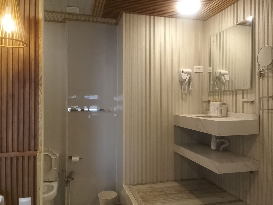 Panoramic Quadruple Room, Balcony, Sea View | Bathroom | Slippers, bidet