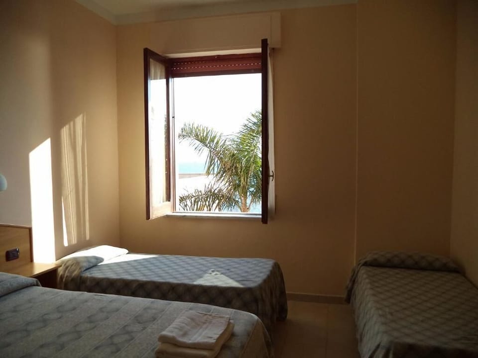 Quadruple Room | Bed sheets