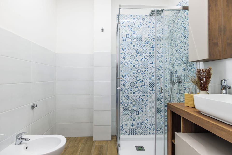 Superior Double Room, City View | Bathroom | Shower, hair dryer, towels, soap