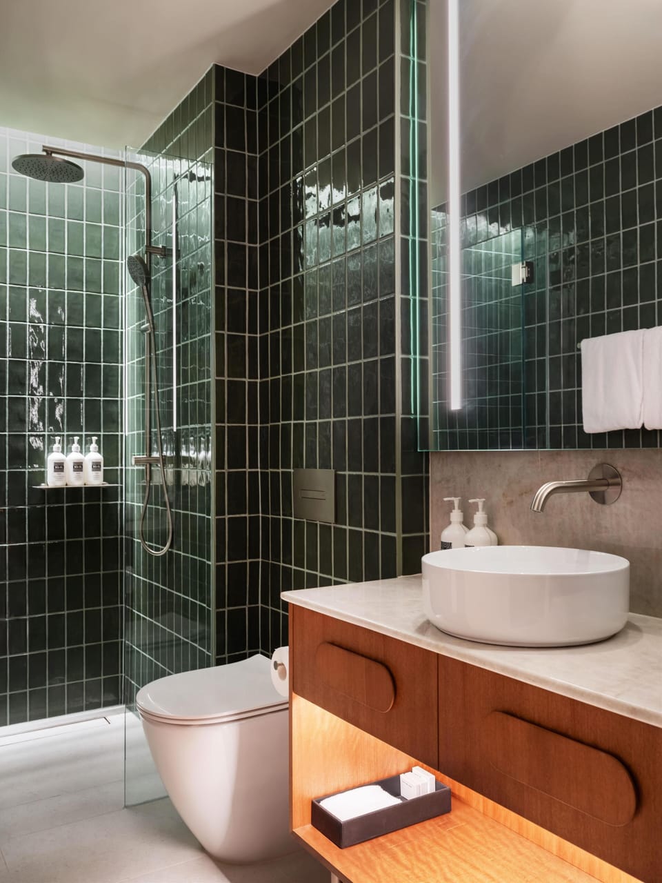 Designer toiletries, hair dryer, towels, soap