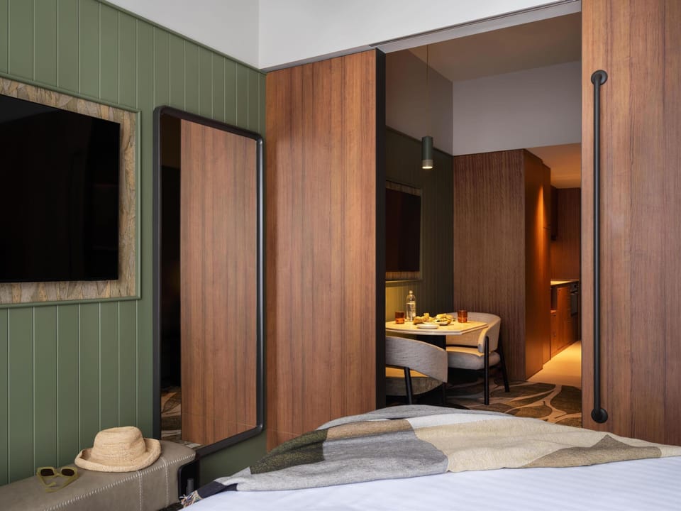 Premium bedding, down comforters, pillowtop beds, in-room safe