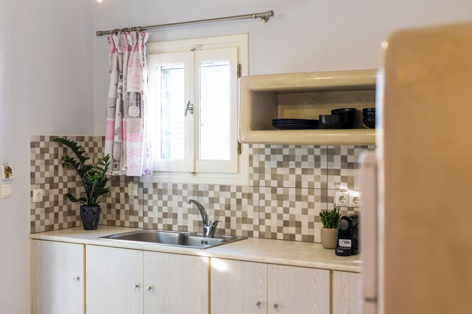 Comfort Apartment | Private kitchen | Full-size fridge, stovetop, espresso maker, electric kettle