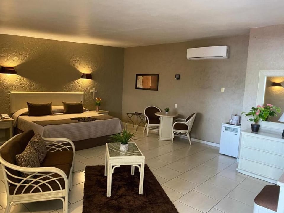 Comfort Suite, Balcony, City View | Laptop workspace, blackout drapes, iron/ironing board, WiFi (free)
