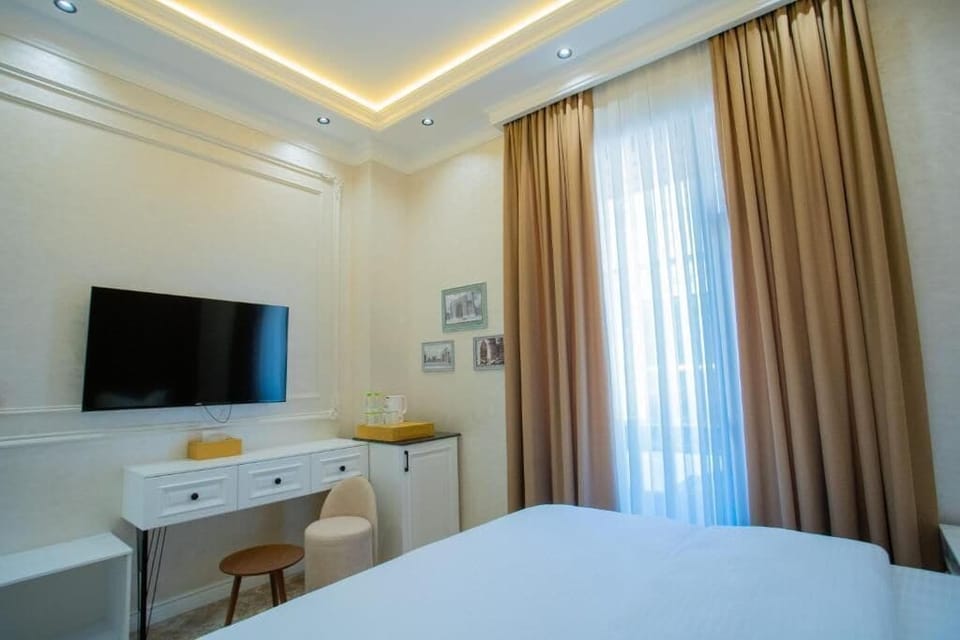 Double Room, Courtyard View | In-room safe, desk, laptop workspace, blackout drapes