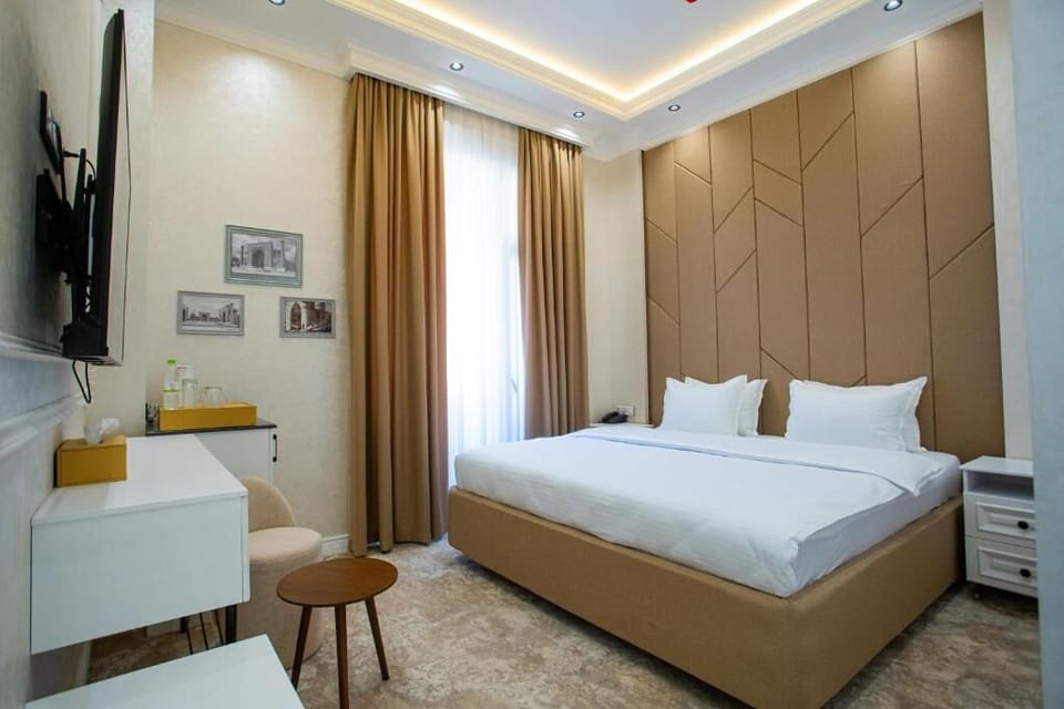 Double Room, Courtyard View | In-room safe, desk, laptop workspace, blackout drapes