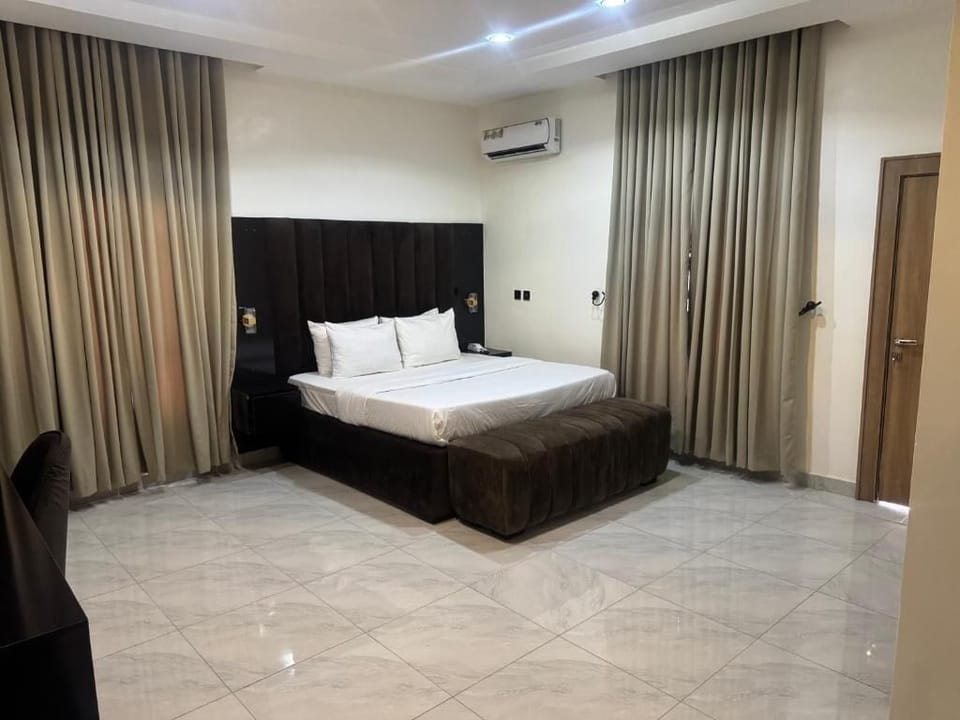 Deluxe Room, Balcony, City View | Desk, laptop workspace, blackout drapes, soundproofing