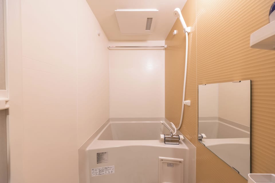 Standard Apartment, Non Smoking, Lanai | Bathroom | Separate tub and shower, free toiletries, hair dryer, slippers