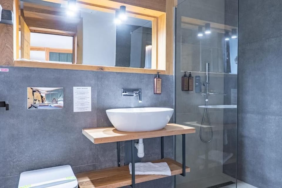 Bathroom | Shower, free toiletries, hair dryer, slippers