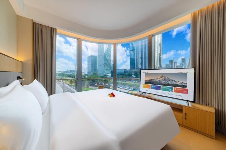 Deluxe Double Room, City View | Free minibar, blackout drapes, soundproofing, iron/ironing board