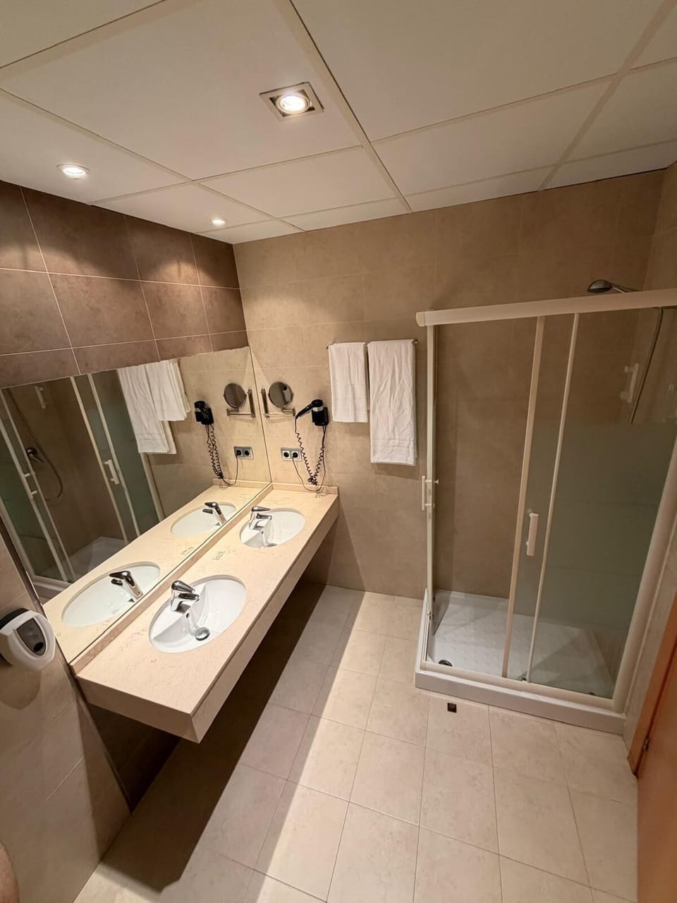 Hair dryer, towels, soap, shampoo