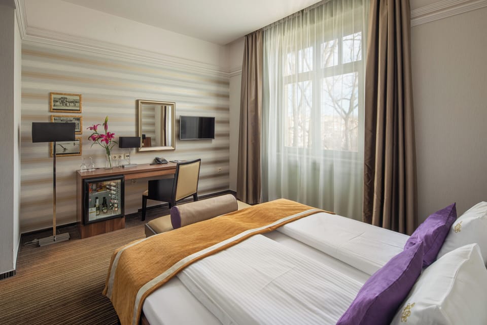 Superior Double or Twin Room | Minibar, in-room safe, desk, soundproofing