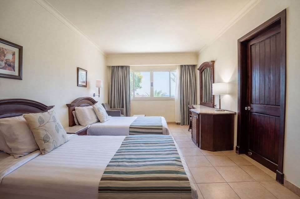 Family Suite, Sea View | In-room safe, iron/ironing board (on request), WiFi (free)